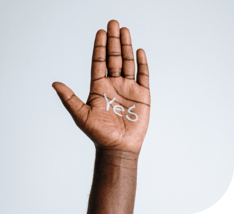 Vorteile eines Sabbaticals symbolisiert durch eine Hand mit dem Wort "Yes".