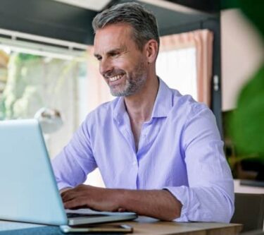 professional male with laptop b2b