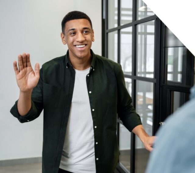 graphics-young-male-student-greeting-location-manager-flexible-staff