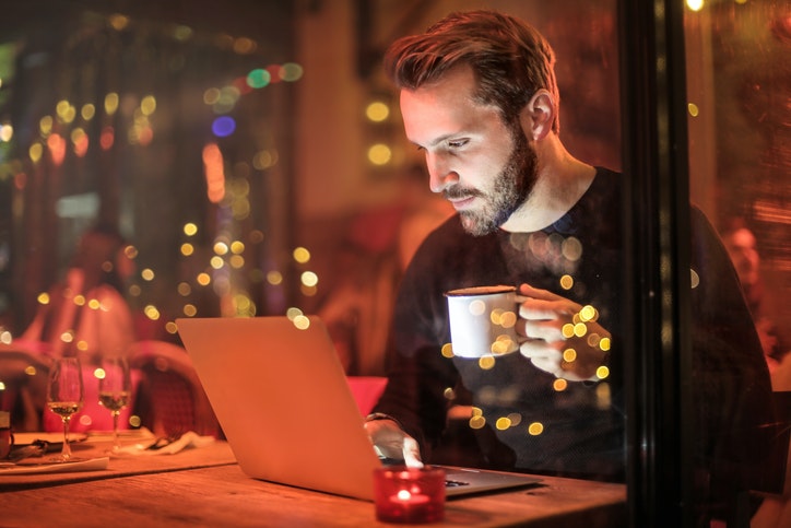 man works in evening flexible working hours