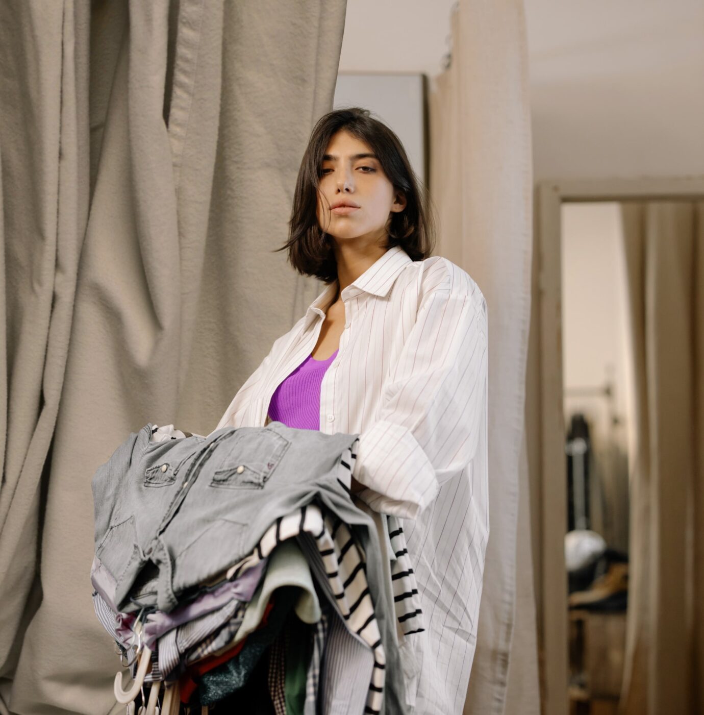 Woman works in a clothing shop