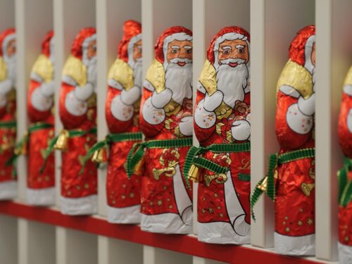 The image shows chocolate Santas which are often sold in Christmas jobs in food retail.